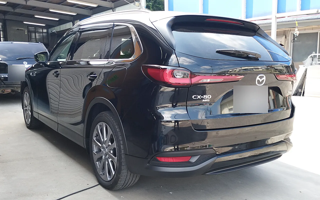 修理後のマツダ CX-80を左後ろの斜めから（完成）